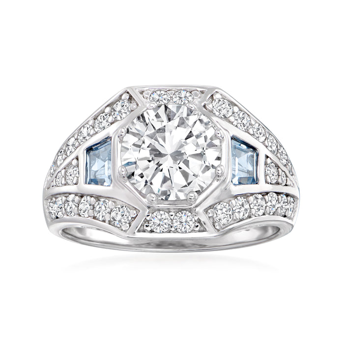 Sterling silver ring with large round clear CZ center and blue simulated aquamarine accents