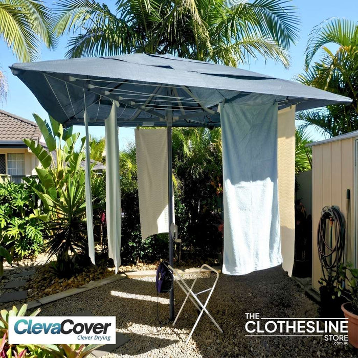 ClevaCover installed on a Hills Folding Rotary Clothesline with washing hanging from the lines.