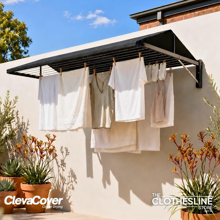 Wall Mounted Clothes with laundry hanging from it with a ClevaCover installed.