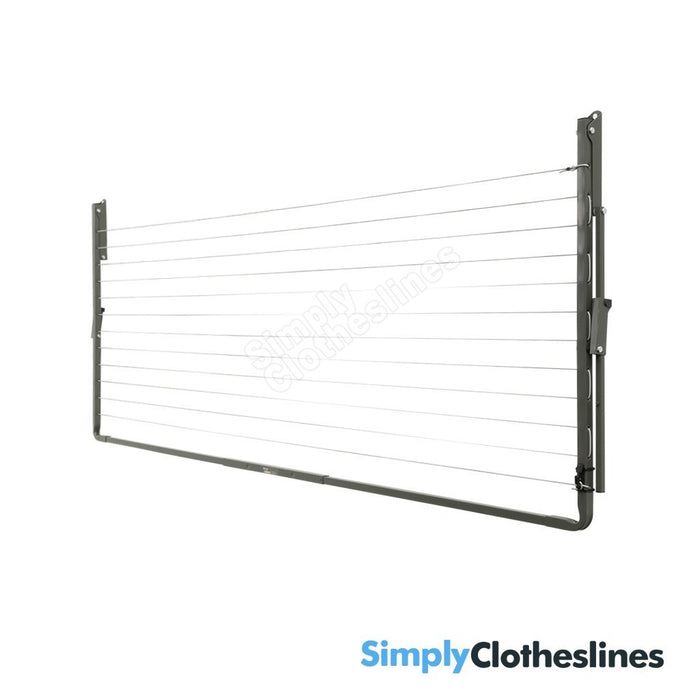 Austral Compact 28 fold down clothesline an angled side view of the frame folded flat against a white.