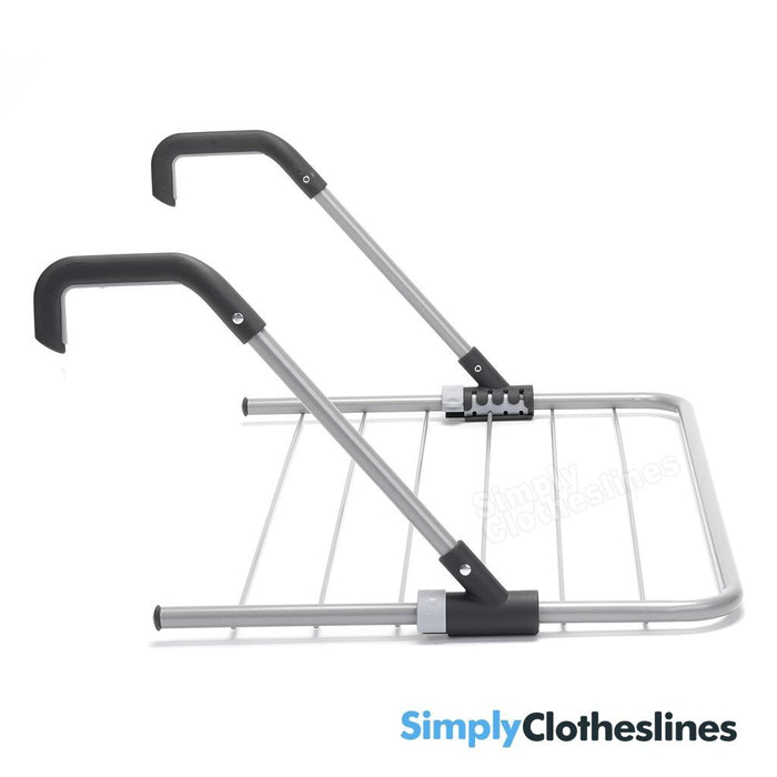 Side view of the Brabantia over the door drying rack showing the adjustable hanging arms and folding frame mechanism.