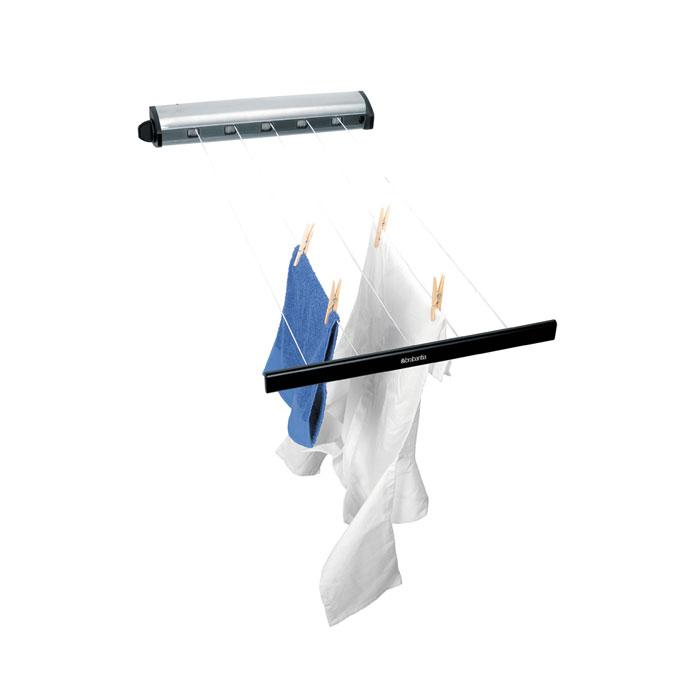 Brabantia Indoor 22m Retractable Clothesline extended with laundry hung from two lines.