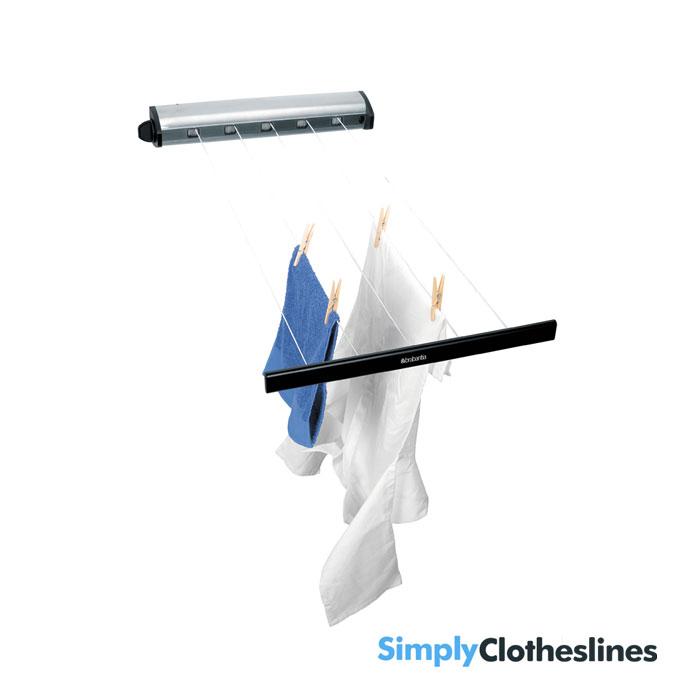 Brabantia Stainless Steel Indoor 22m Retractable Clothesline extended with a white background.