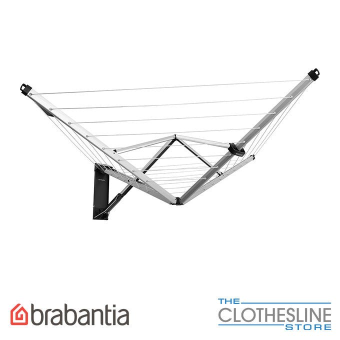 Brabantia WallFix 24m outdoor clothesline mounted to wall in open position.