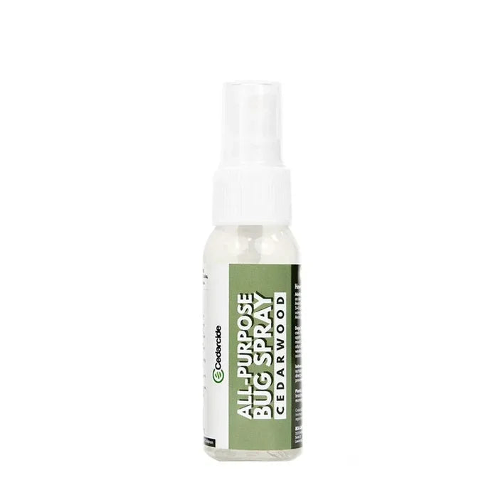 Travel-size Cedarcide All-Purpose Bug Spray cedarwood bottle on a white background.