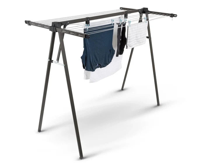 Daytek portable clothesline several garments pegged to the clothesline cords.