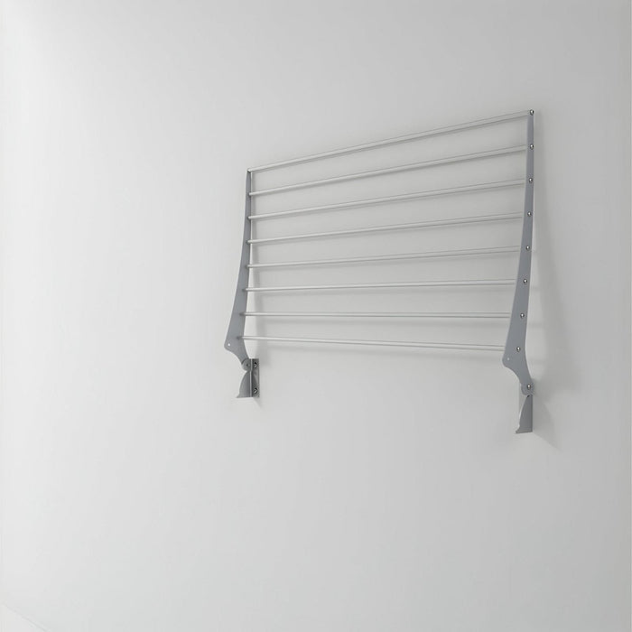FoxyDry Fold wall mounted clothesline drying rack folded flat against wall.