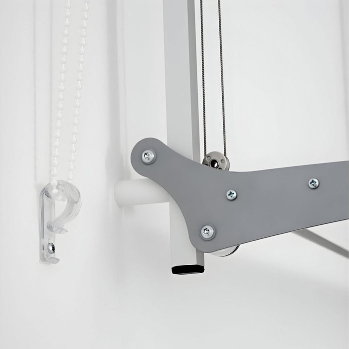 FoxyDry Wall height adjustable mechanism detail with aluminium wall bracket, pulley system and support arm for wall mounted clothes airer.