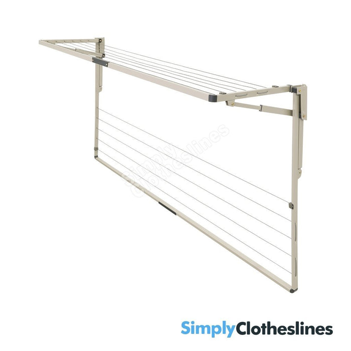 Angled view of the Hills Everyday Double fold down clothesline showing the secondary frame open and the larger frame folded flat against the wall.