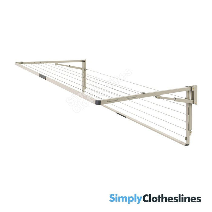 Angled view of the Hills Everyday Double fold down clothesline showing the main frame open and the smaller frame folded flat against the wall.