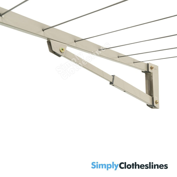 Angled view from below of the Hills Everyday Single fold down clothesline showing the strut, clothesline cord and frame.