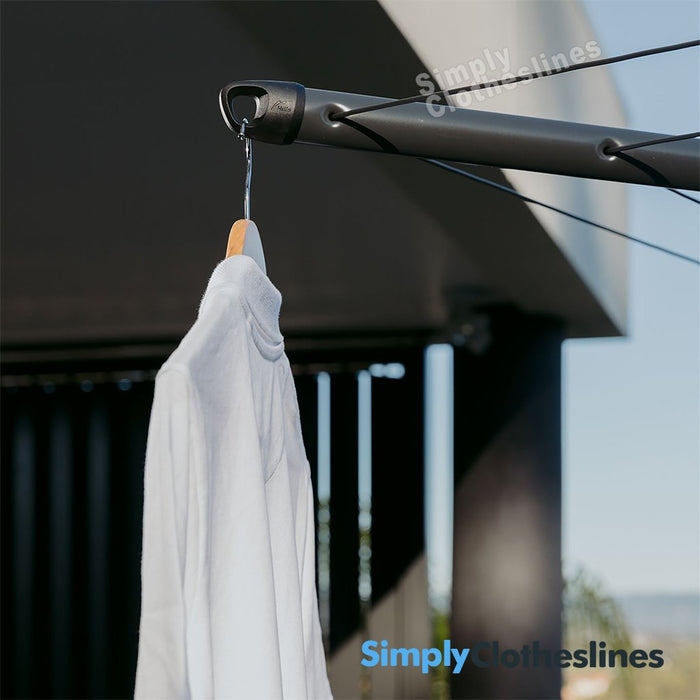 Detailed view of the integrated clothes hanger hook at the end of a Hills Rotary 6 Line clothesline arm.