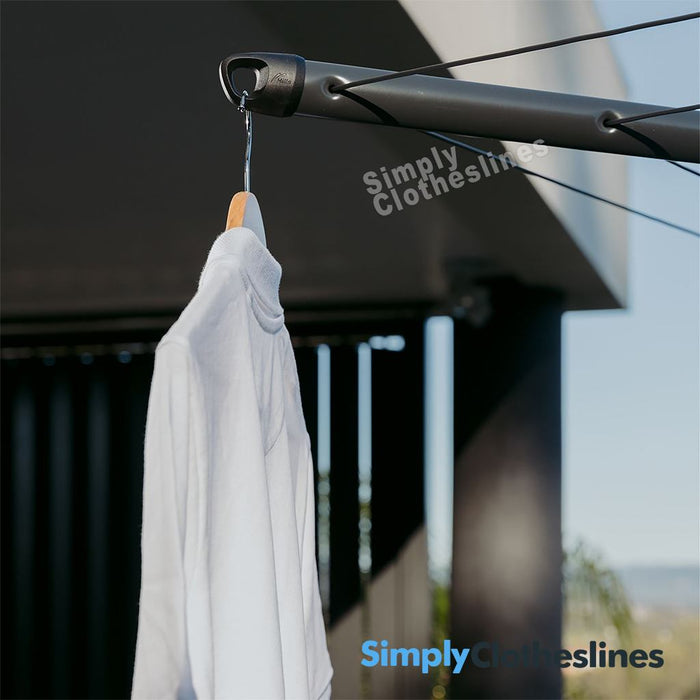 Detailed view of the integrated clothes hanger hook at the end of a Hills Rotary 7 Line clothesline arm.