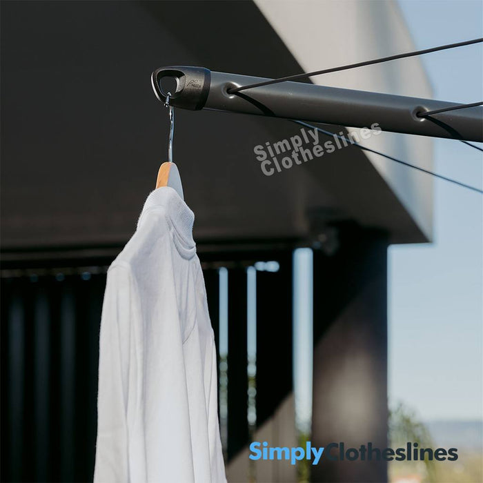 Detailed view of the integrated clothes hanger hook at the end of a Hills Rotary 8 Line clothesline arm.