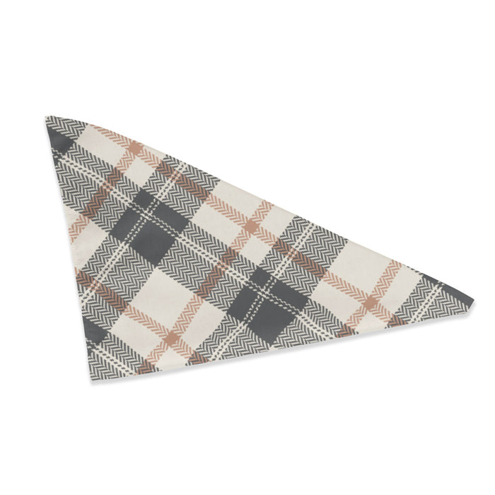 Triangular dog bandana in neutral gray, cream, and tan plaid laid flat.