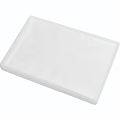 White silicone dog grass pad tray with raised edges, shown empty from an angled view.
