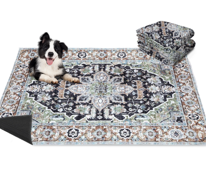 Border Collie lying on an Arrow Sage Forest Taupe washable dog mat in a dark green Persian-style pattern with a non-slip backing.
