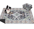Border Collie lying on an Arrow Sage Forest Taupe washable dog mat in a dark green Persian-style pattern with a non-slip backing.