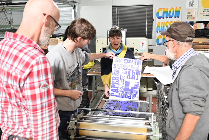 Freshly printed poster in a wood type poster printing workshop with Phil Gambrill in Wayzgoose 2023