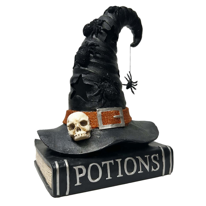 Witch Hat on Books - 10" Tall from the 2026 Moonlight Masquerade Halloween collection at Roger's Gardens