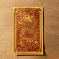 Year of the Dragon print featuring a dragon with a celestial background on a brown background