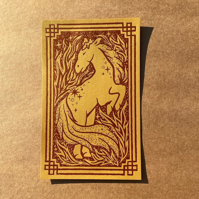Bright Press x Banksia Creative's Year of the Horse print with a fiery horse design and decorative border on a brown textured background