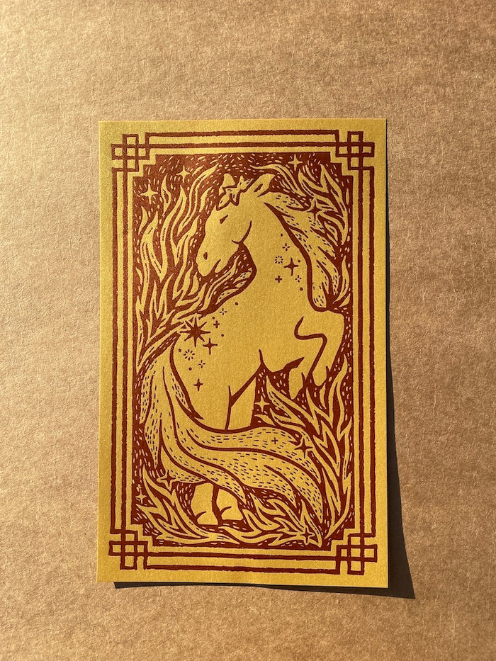 Bright Press x Banksia Creative's Year of the Horse print with a fiery horse design and decorative border on a brown textured background